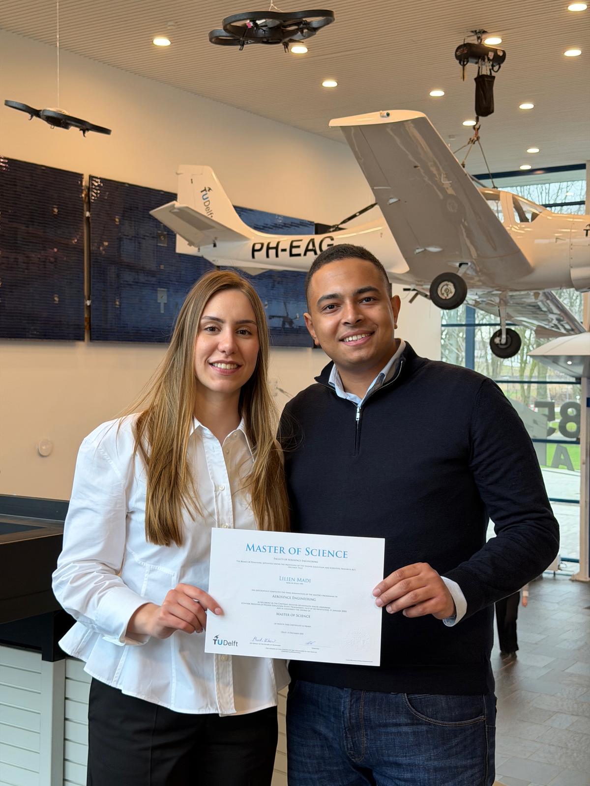 Lilien and Zeyad with the diploma