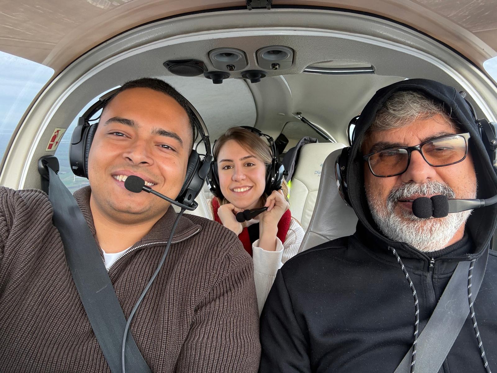 In the cockpit of a small plane the day after graduation