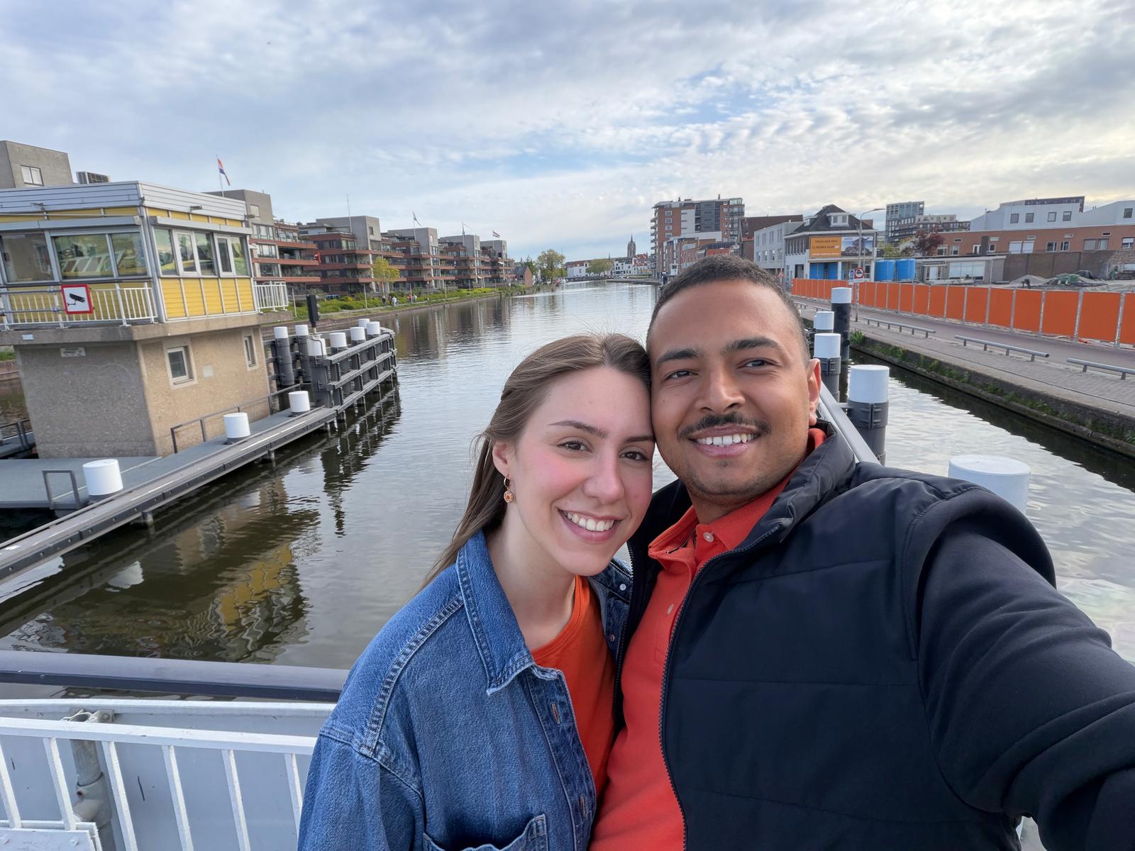 On a boat in orange for King's Day
